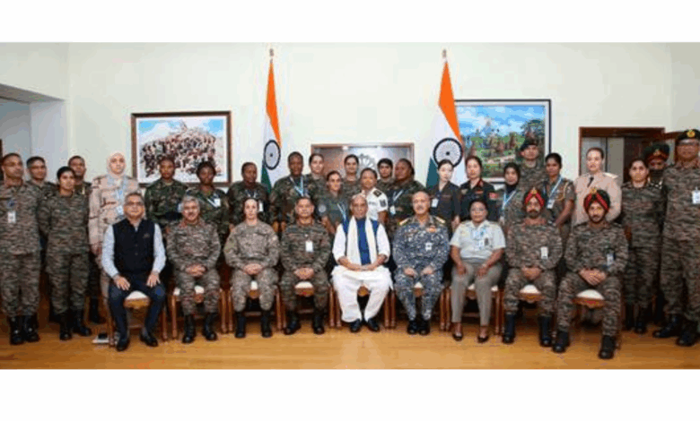 Raksha Mantri interacts with global women peacekeepers taking part in UN Women Military Officers Course 2025 in New Delhi