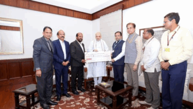 Repco bank presents a cheque of Rs. 22.90 crore towards dividend for 2024-25 to Union Home Minister and Minister of Cooperation, Shri Amit Shah in New Delhi